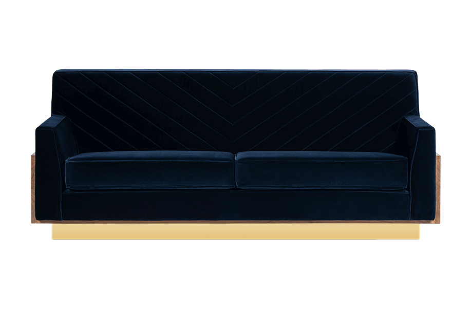 Afonso Sofa by Royal Stranger, luxury two-seater sofa with plush upholstery, wooden backrest and brass-trimmed base, combining comfort, elegance and modern design.