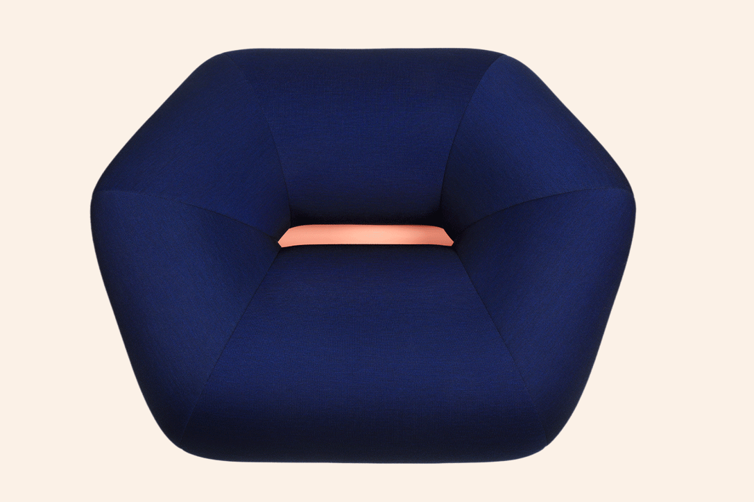 Origami Armchair with bold geometric forms, fully upholstered on a lacquered cylindrical base, combining sculptural elegance and comfort for contemporary interiors