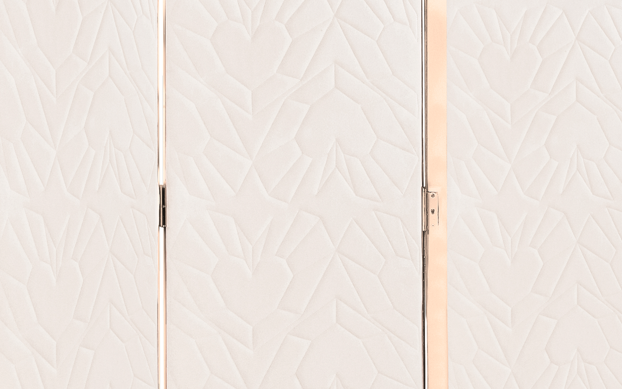 Heart-shaped fabric panels with brass frames create the Queen Heart Folding Screen, a luxury designer room divider combining playful elegance and privacy for modern interiors.