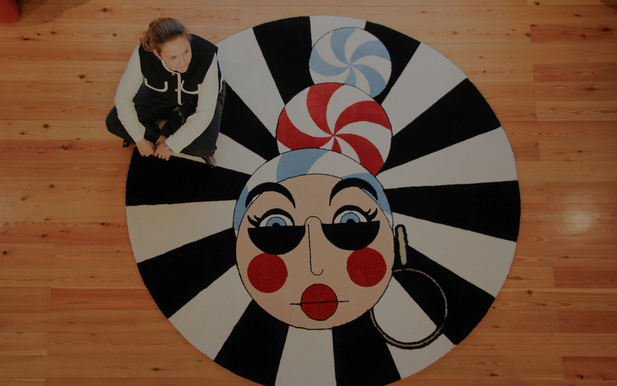 MA'AM Collection luxury statement piece showcasing the strength of luminous brass, striped fabric, and handcrafted porcelain details for residential and hospitality projects.