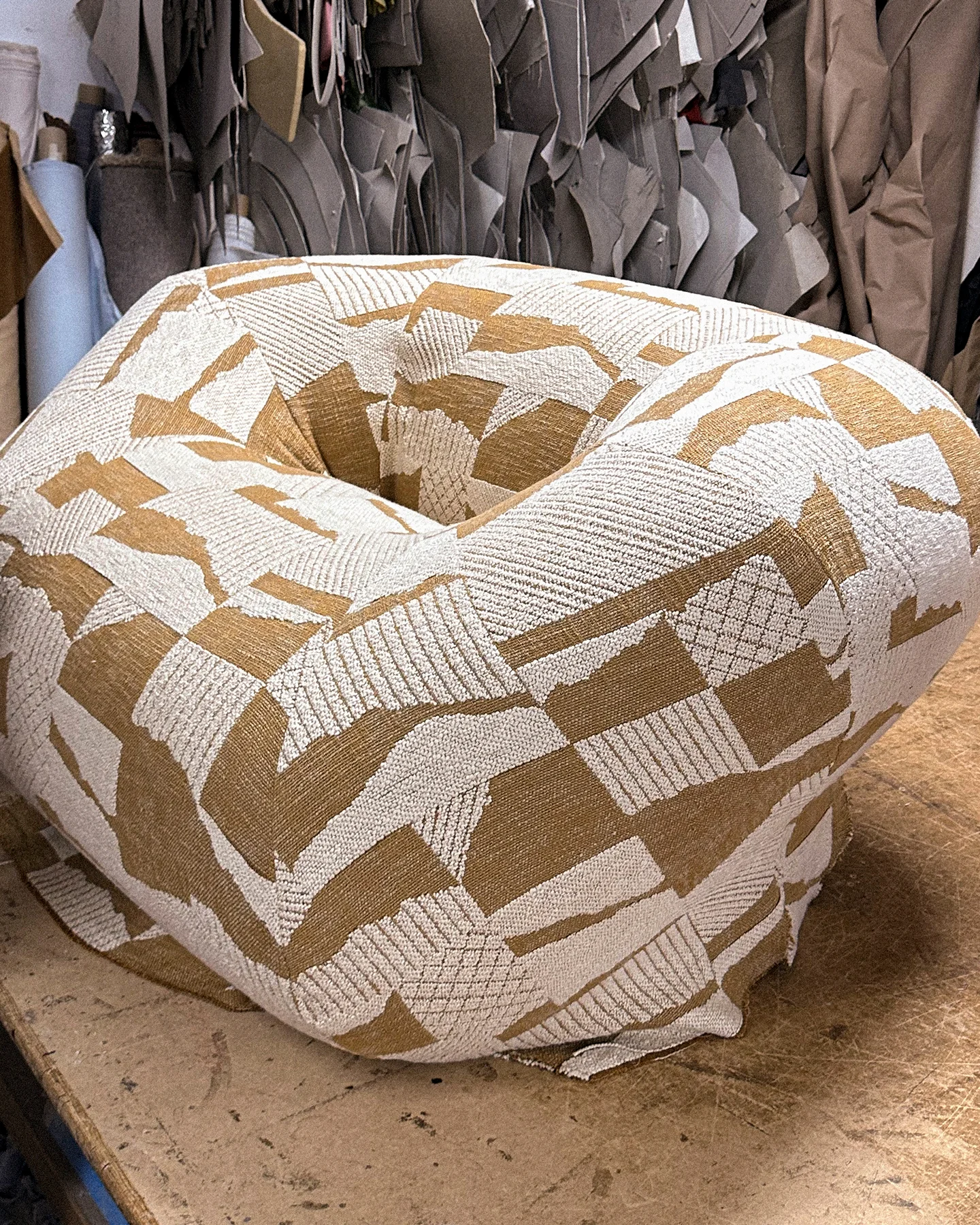 Luxury furniture showcasing asymmetrical design, subtle discomfort, and elegant strangeness in a contemporary interior