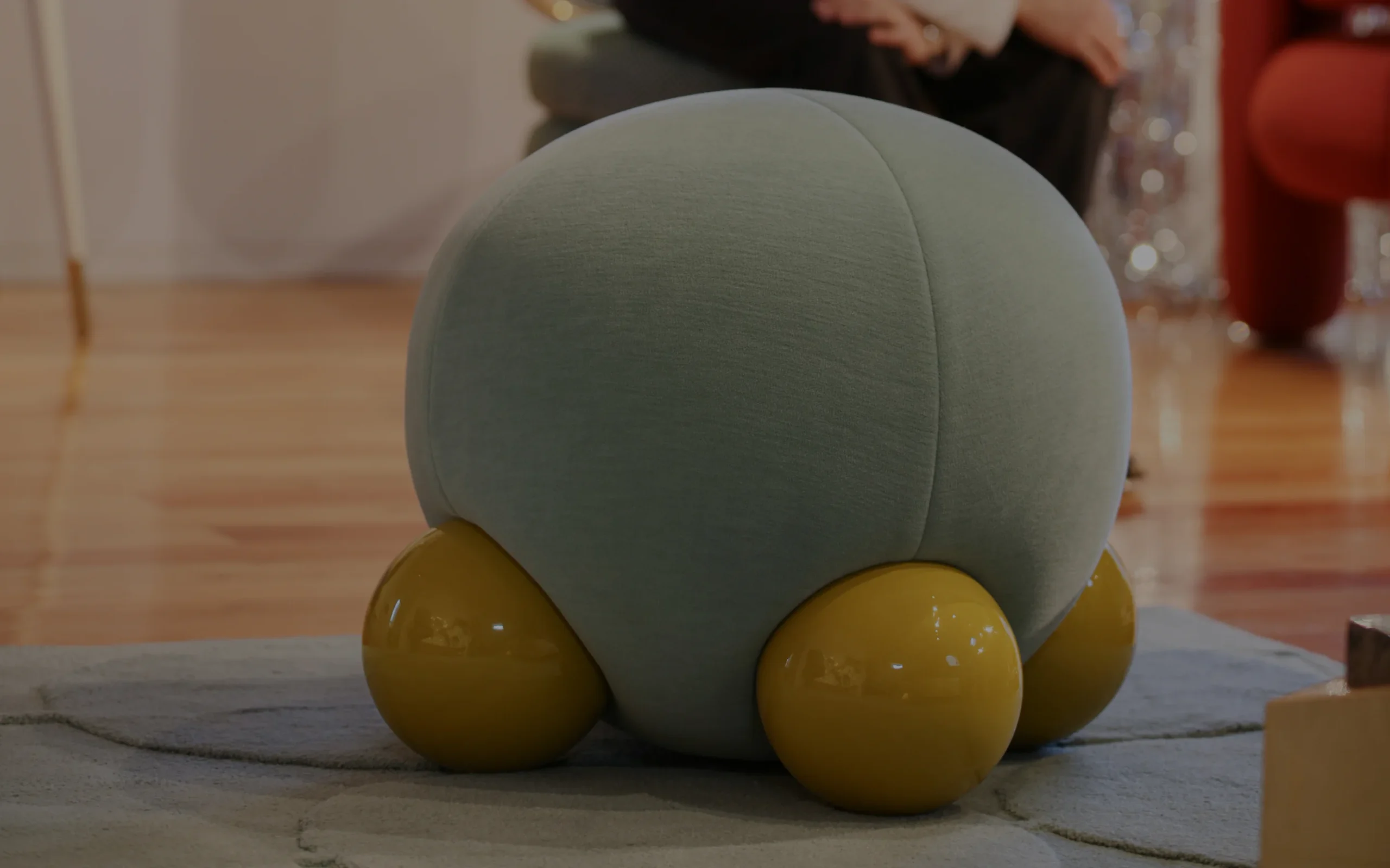 Luxury furniture showcasing asymmetrical design, subtle discomfort, and elegant strangeness in a contemporary interior